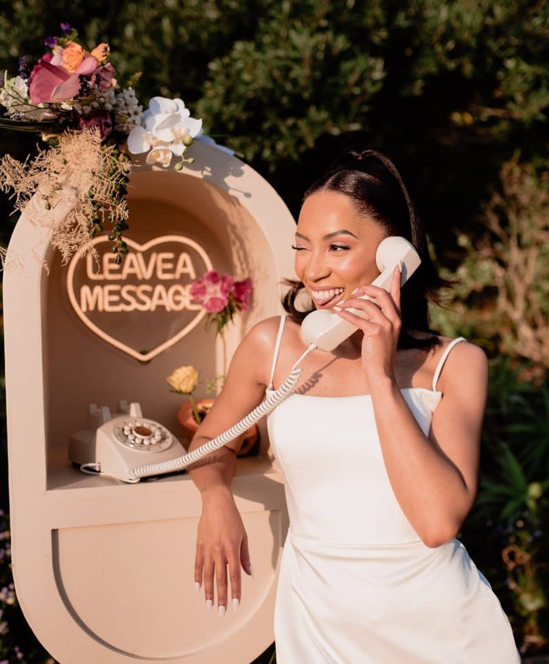 Vintage-style audio guestbook phone booth for wedding guests to record messages.