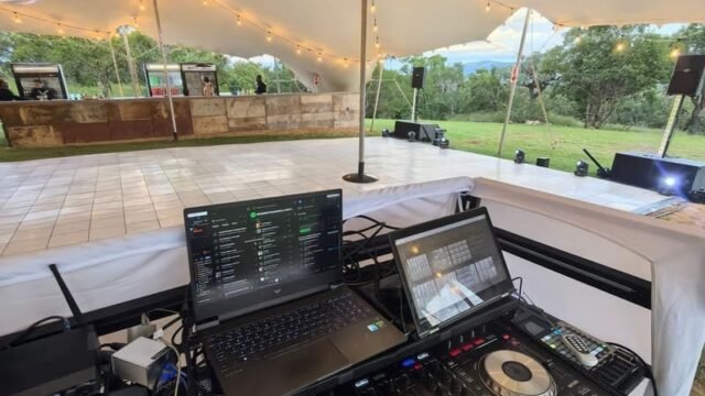 DJ setup with lighting by Xtreme Promotions Sound and Lighting