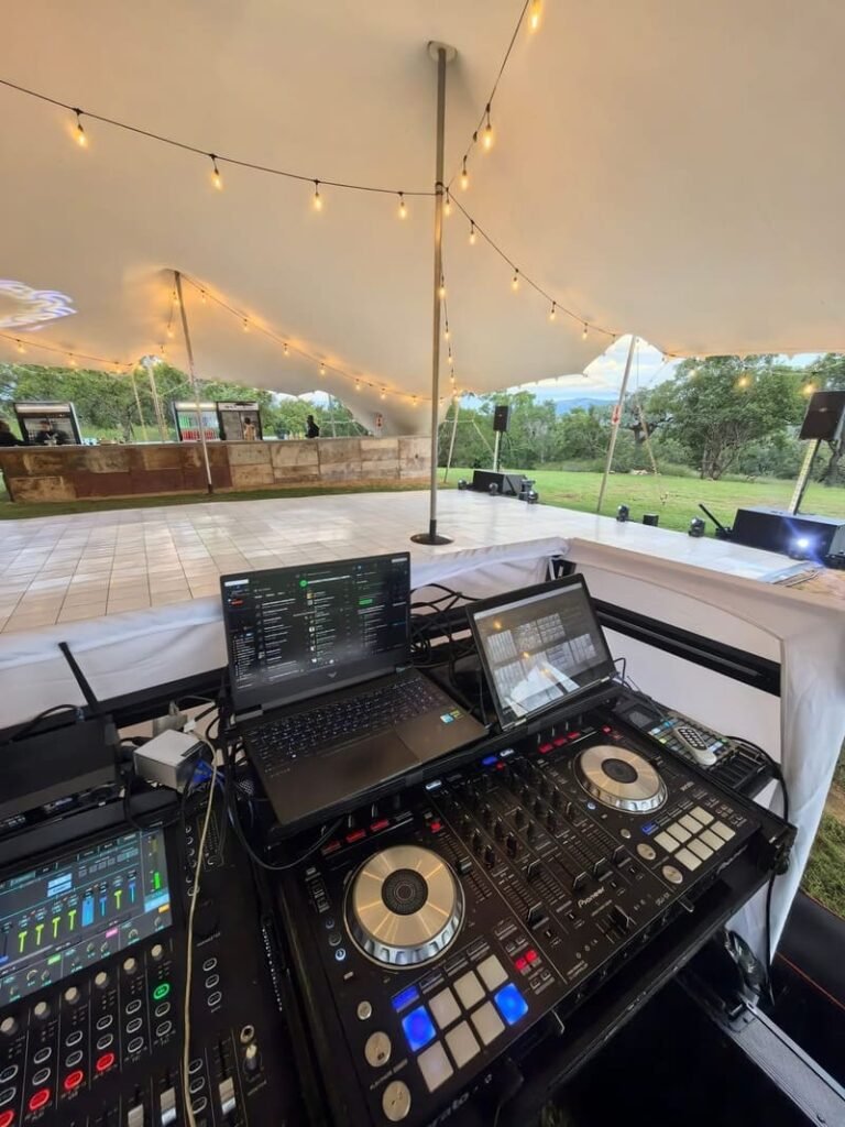 DJ setup with lighting by Xtreme Promotions Sound and Lighting