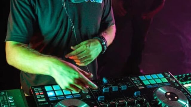 DJ setup with lighting by Xtreme Promotions Sound and Lighting