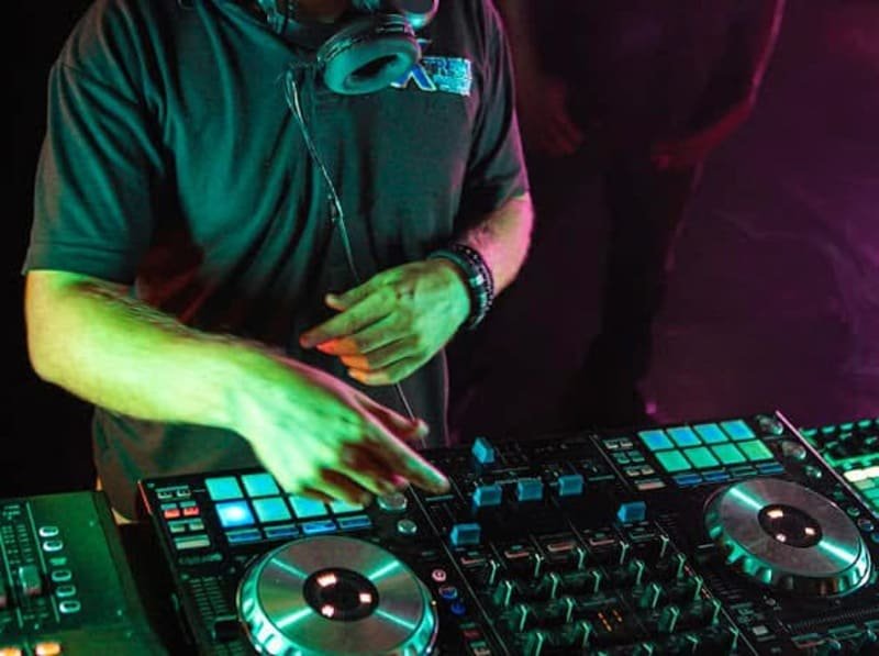 DJ setup with lighting by Xtreme Promotions Sound and Lighting
