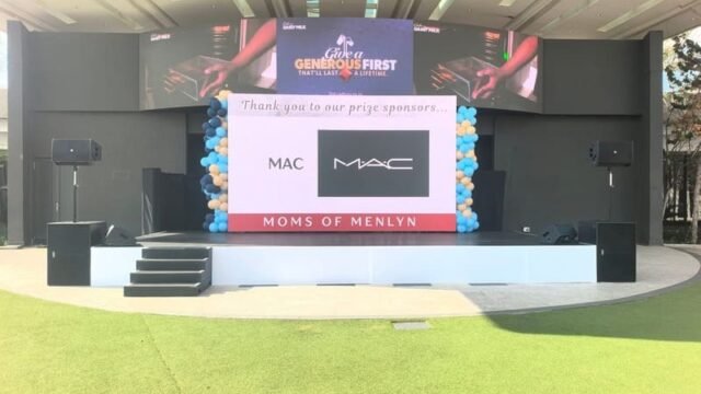 DJ setup with lighting by Xtreme Promotions Sound and Lighting
