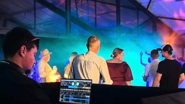 DJ setup with lighting by Xtreme Promotions Sound and Lighting