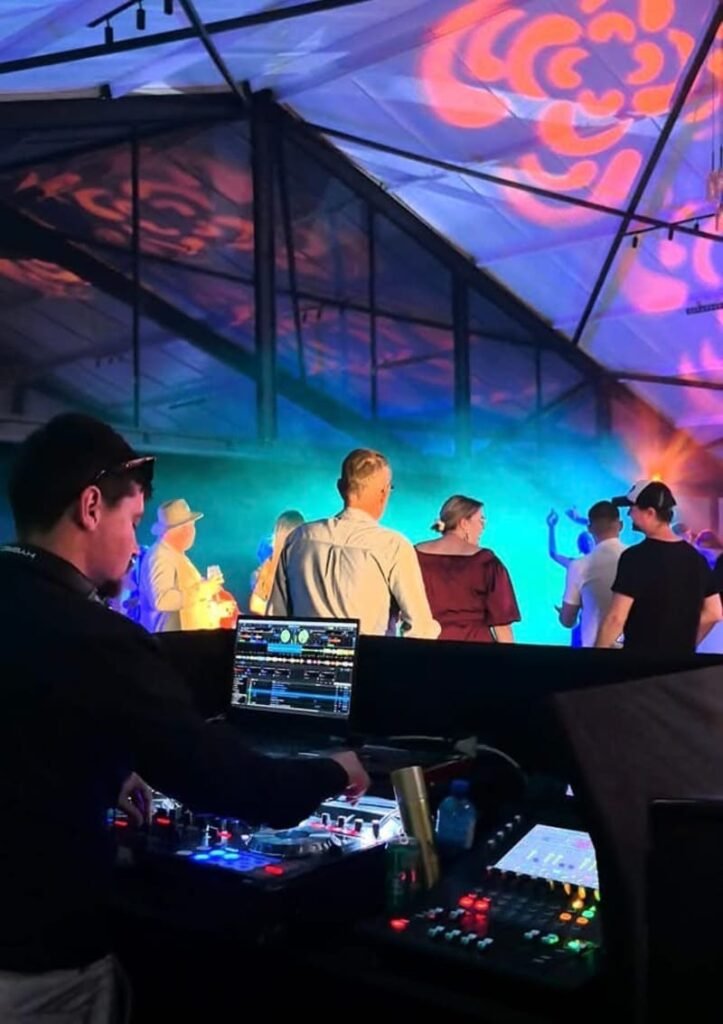 DJ setup with lighting by Xtreme Promotions Sound and Lighting
