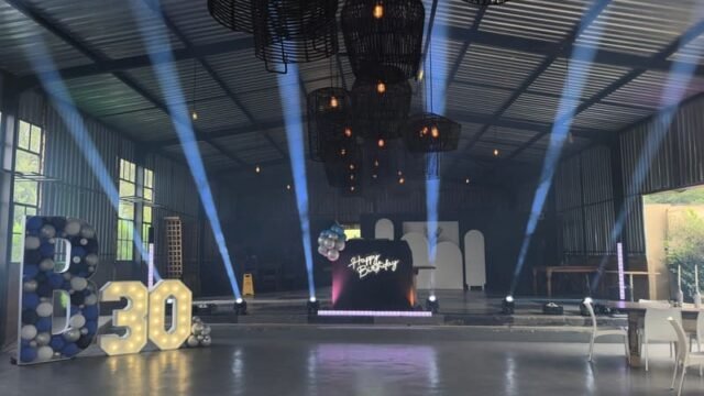 DJ setup with lighting by Xtreme Promotions Sound and Lighting